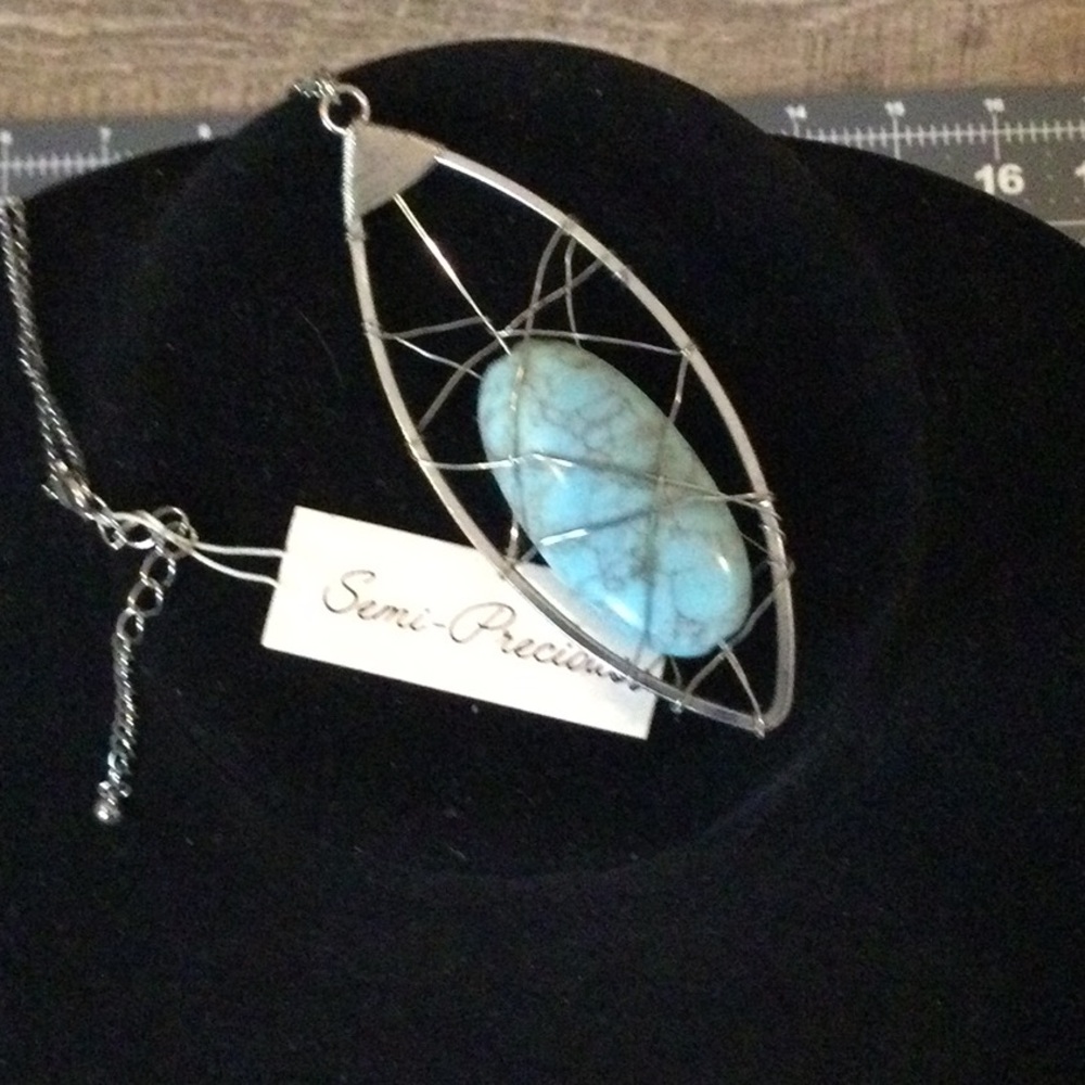 Elegant Silver Necklace with Blue Pendant